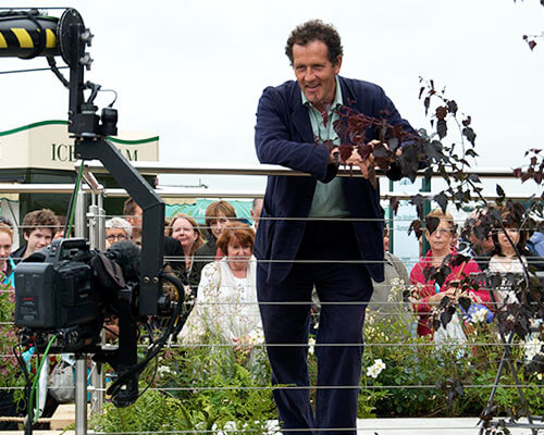 Monty Don filming at RHS Tatton Park Flower Show - leaning on an S3i Balustrade