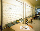Click to enlarge Wire support system in an opticians