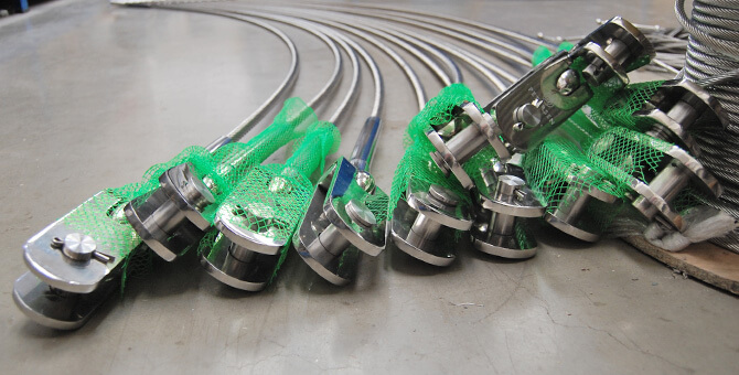 Wire Rope Assemblies with Swaged Toggle Ends
